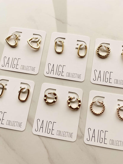 Saige Collective - Goldie Huggie Hoops - 14kt plated 