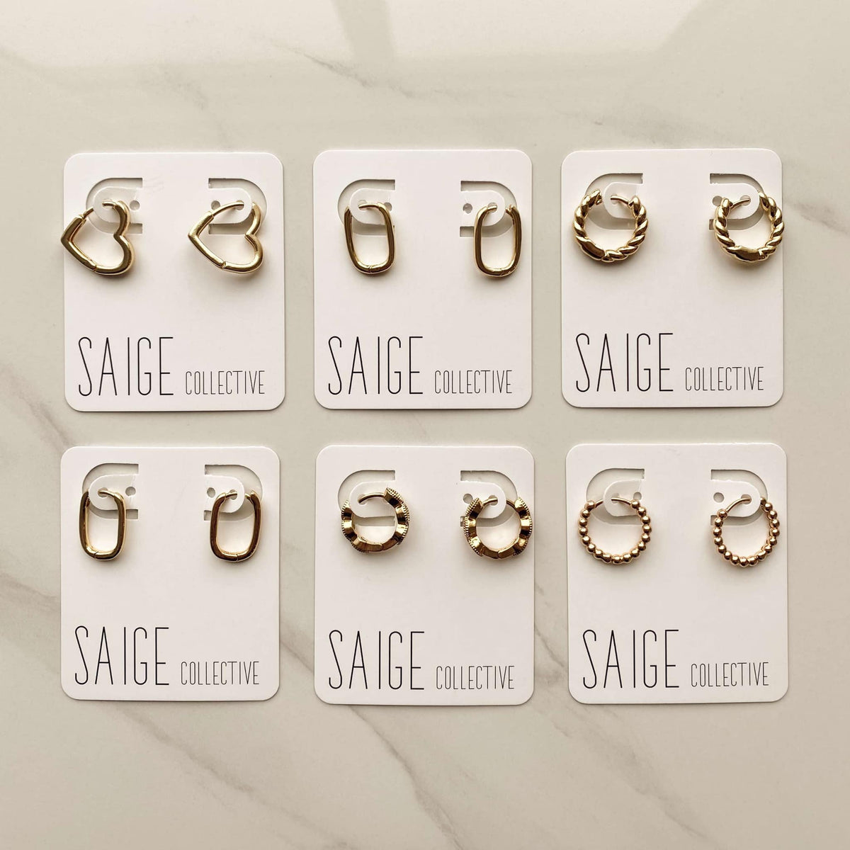 Saige Collective - Goldie Huggie Hoops - 14kt plated 